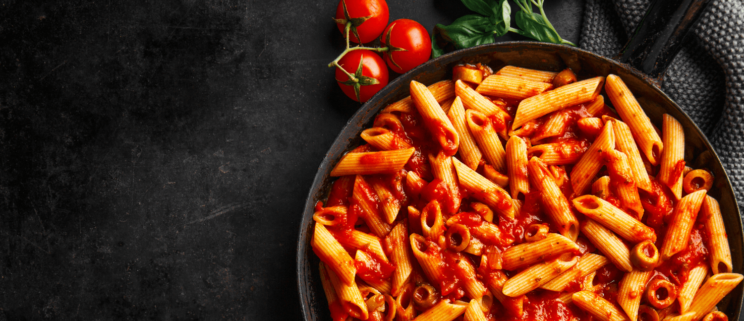 a pot of pasta in tomato sauce